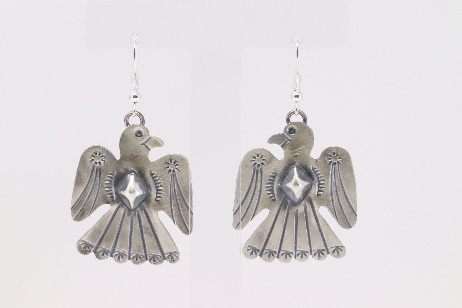 Native American Navajo Handmade Sterling Silver: This is a Native American Navajo Handmade Sterling Silver Thunderbird Dangle Earrings by Tim Yazzie.