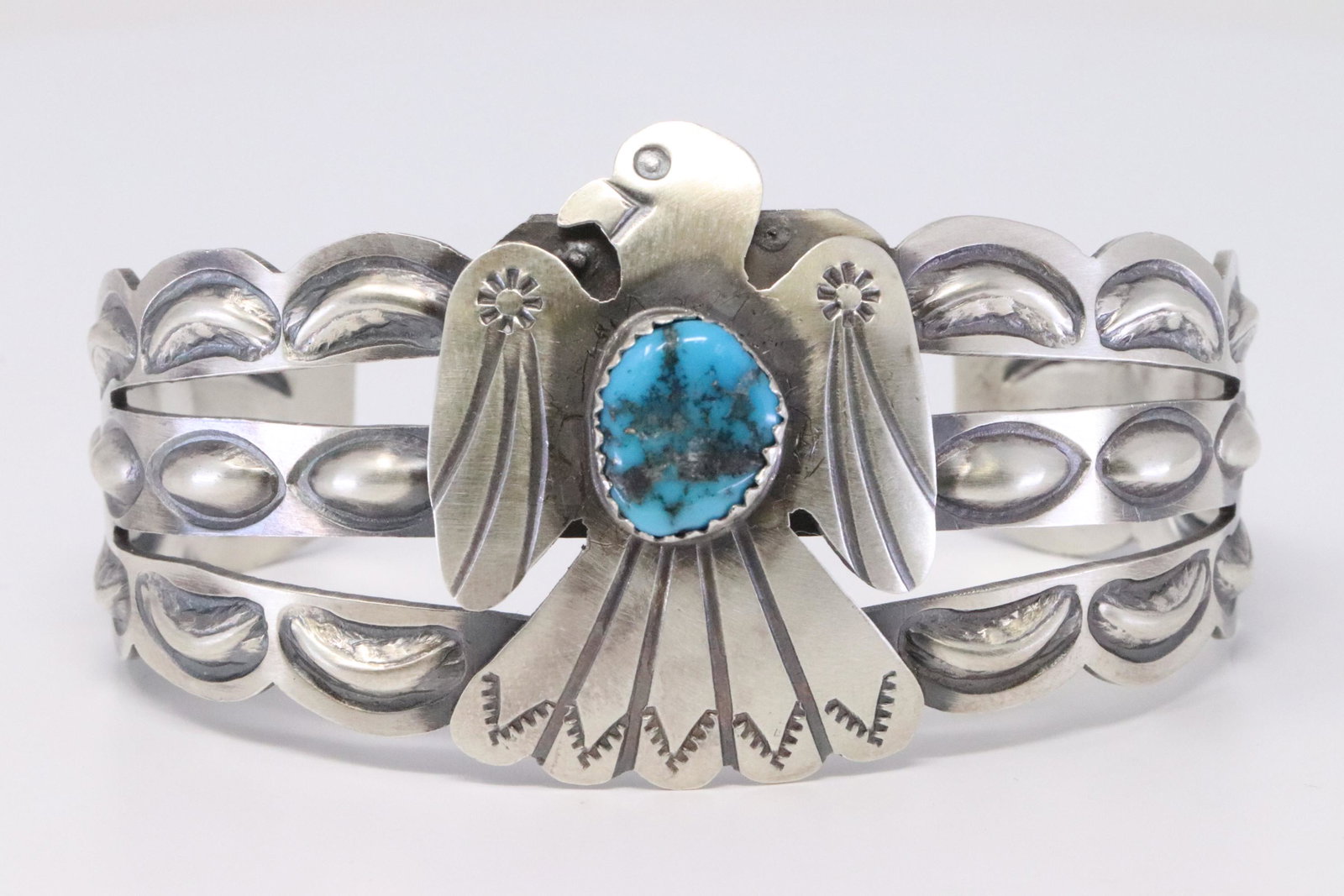Native American Navajo Handmade Sterling Silver: This is a Native American Navajo Handmade Sterling Silver Turquoise Thunderbird Bracelet by Tim Yazzie.
