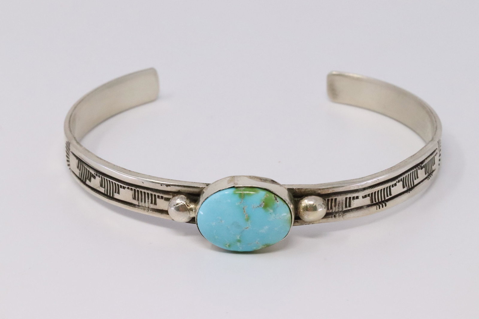 Native American Handmade Sterling Silver Navajo: This is a Native American Handmade Sterling Silver Navajo Turquoise Bracelet By Rick Enrriquez.