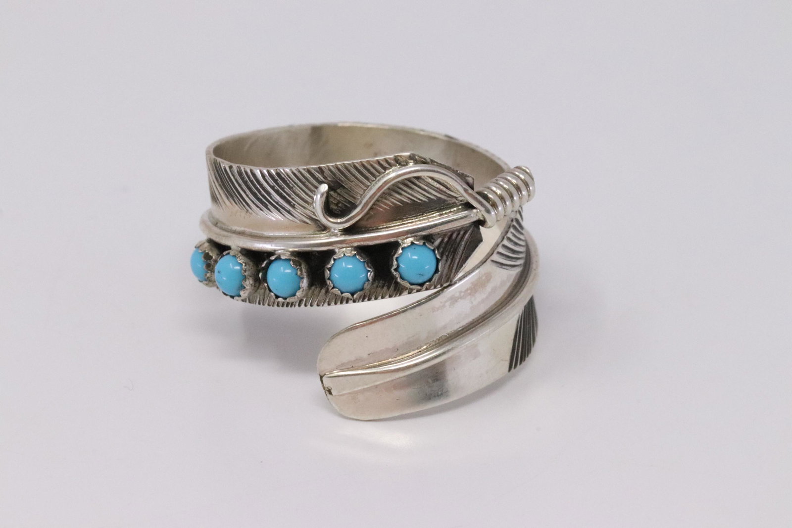 Native American Handmade Sterling Silver Navajo: This is a Native American Handmade Sterling Silver Navajo Turquoise Feather Ring By Byron Begay. Ring size: 10.50"