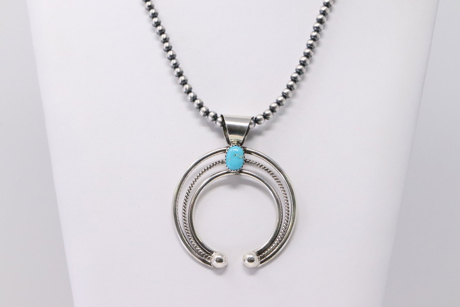 Native American Navajo Handmade Sterling Silver: This is a Native American Navajo Handmade Sterling Silver Turquoise Pendant with Beaded Pearl Necklace by Leon Frances Kirlie. Necklace Length is 23.00in. REF: R.Y