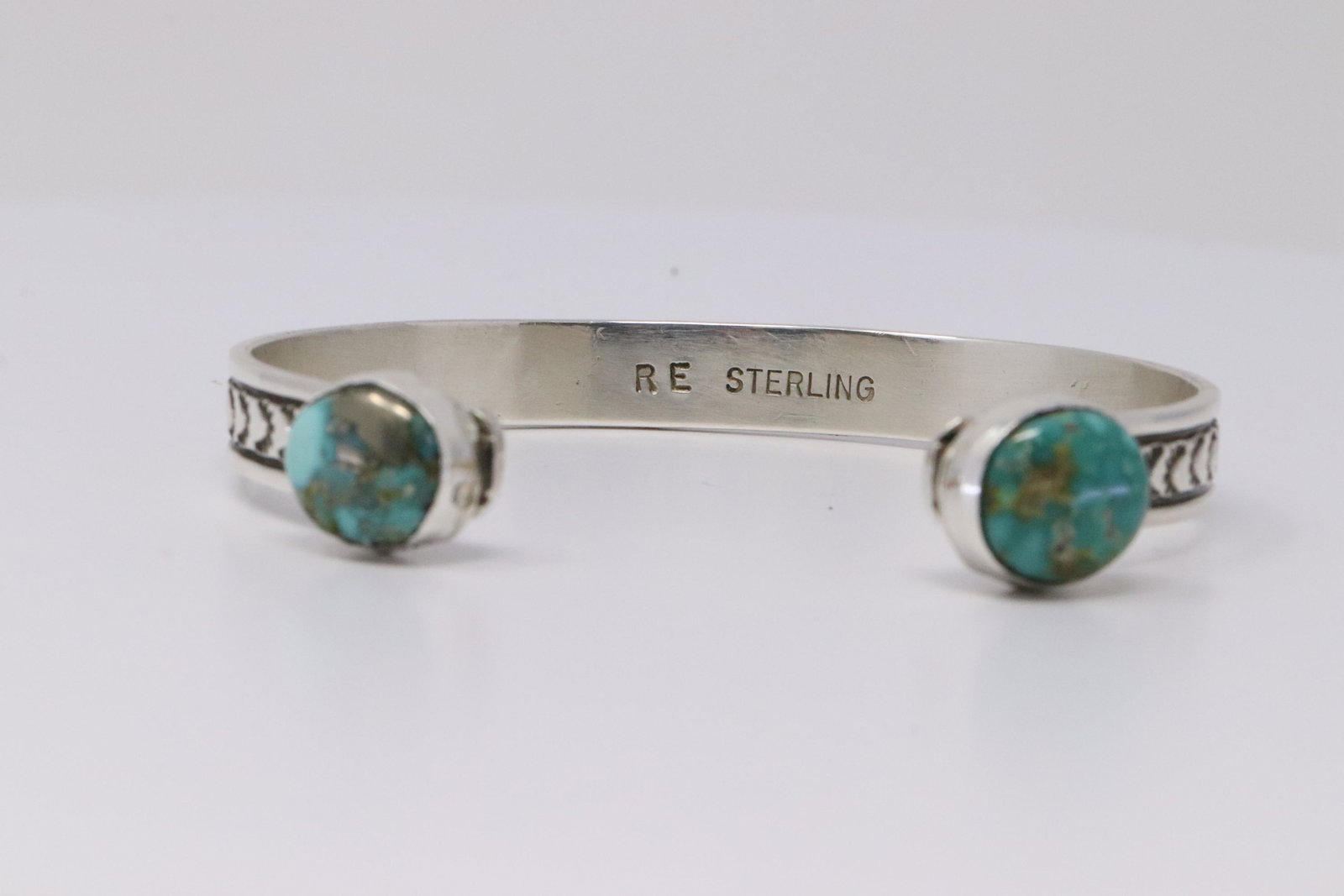 Native American Navajo Handmade Sterling Silver: This is a Native American Navajo Handmade Sterling Silver Turquoise Bracelet By Rick Enriquez.