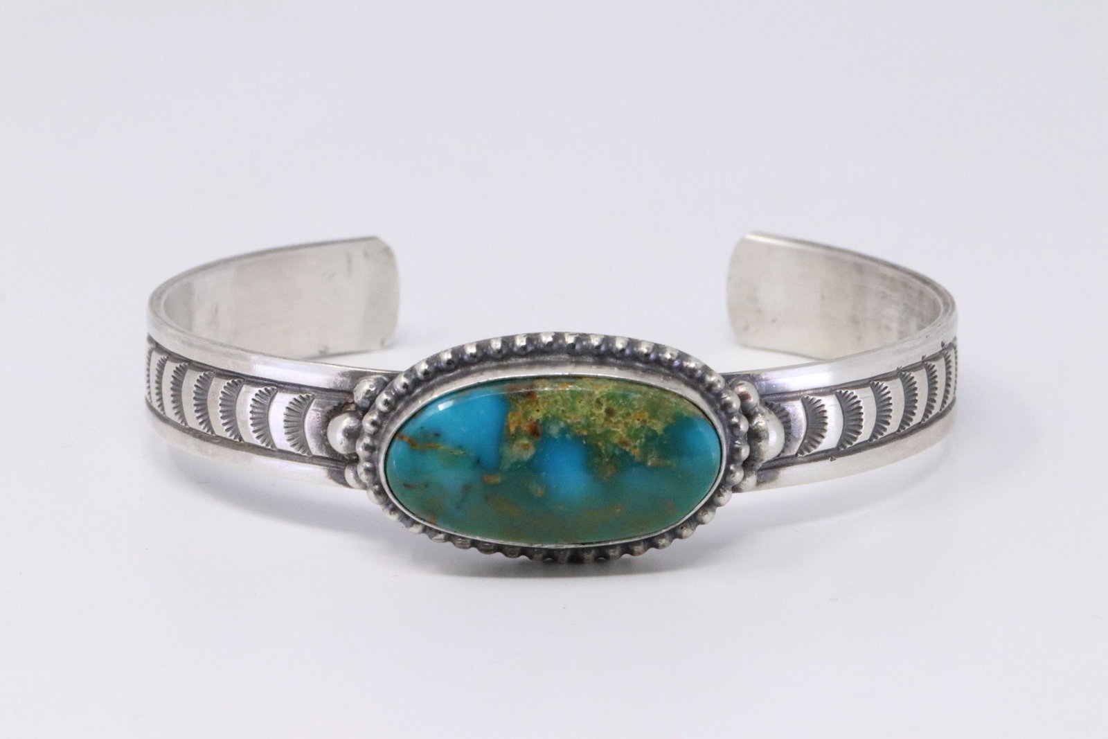Native American Navajo Handmade Sterling Silver: This is a Native American Navajo Handmade Sterling Silver Turquoise Bracelet by Rick Enriquez.