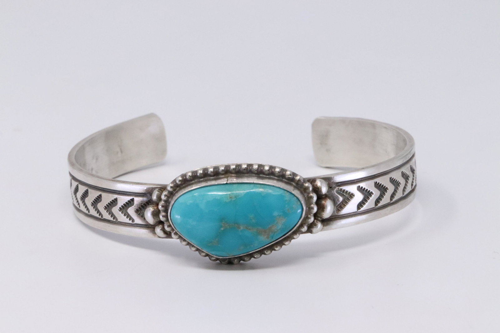 Native American Navajo Handmade Sterling Silver: This is a Native American Navajo Handmade Sterling Silver Turquoise Bracelet by Rick Enriquez.