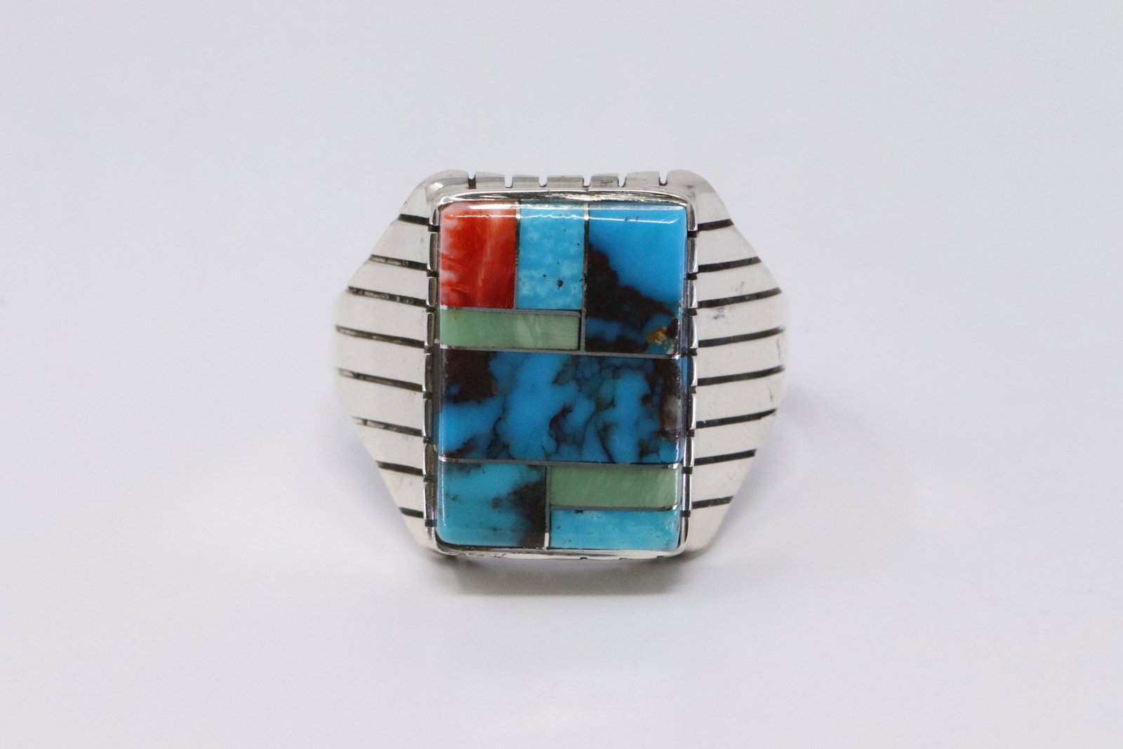 Native American Navajo Handmade Sterling Silver: This is a Native American Navajo Handmade Sterling Silver Multi-Color Inlay Ring by Ray Jack. Ring size is 14.50