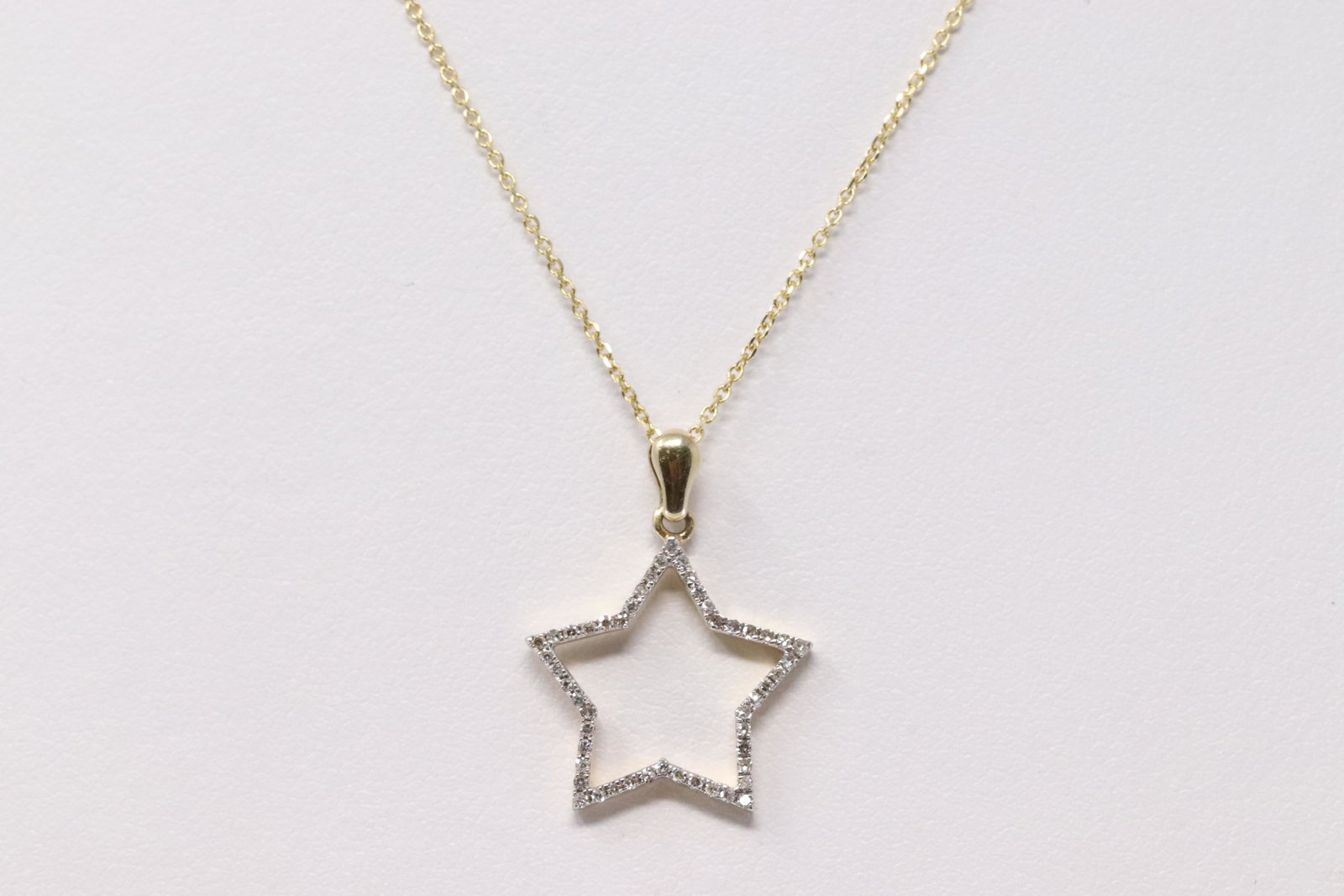 14Kt Yellow Gold Diamond Star Pendant. (1 of 4)