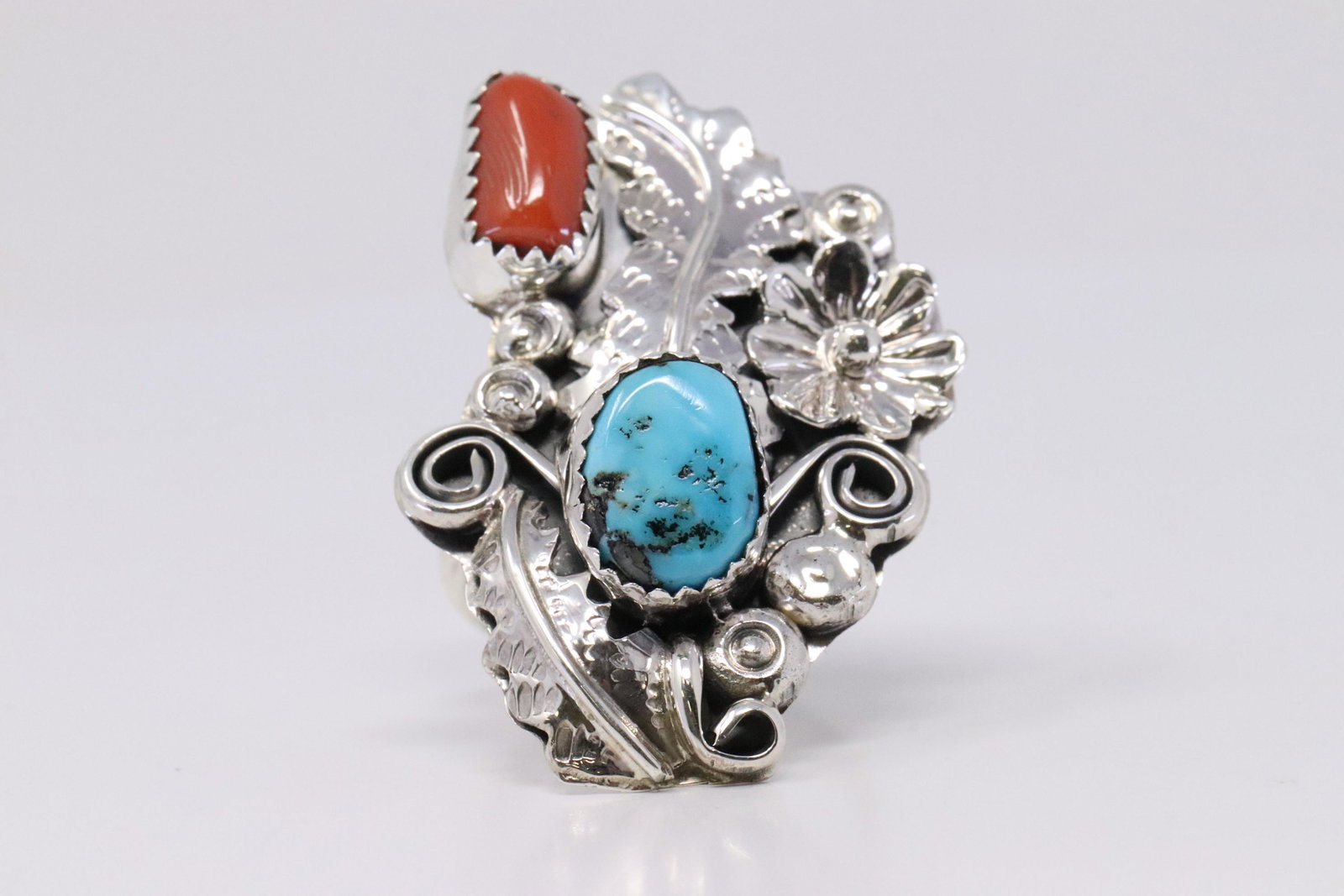 Native American Navajo Handmade Sterling Silver: This is a Native American Navajo Handmade Sterling Silver Turquoise Coral Ring By Harry B. Yazzie. Ring size: 7.00.