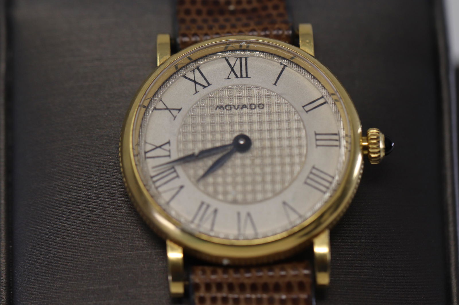 18Kt Movado Ladies Watch: A ladies 18kt Movado Self wind watch. Watch metal: 18kt Yellod Gold. Self Wind. Working condition. Sapphire Crown. Total weight: 20.80 grams.