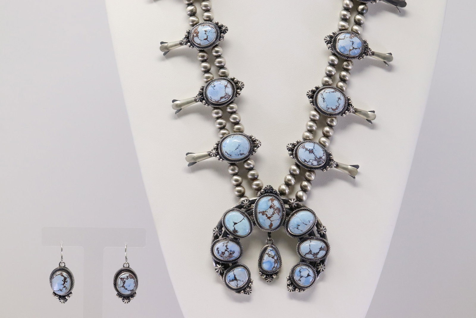 Native American Navajo Handmade Sterling Silver Golden: This is a Native American Navajo Handmade Sterling Silver Golden Hill Turquoise Squash Blossom Necklace & Dangling Earring's Set By Thomas Francisco. Necklace length: 28.00"