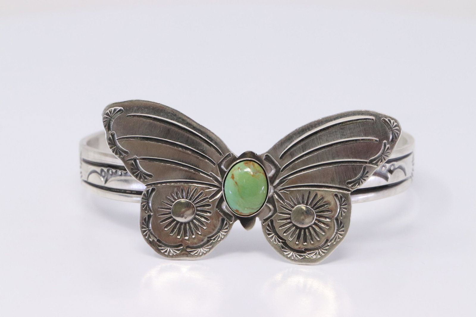 Native American Navajo Handmade Sterling Silver Kingman: This is a Native American Navajo Handmade Sterling Silver Kingman Turquoise Butterfly Bracelet By Rick Enriquez.