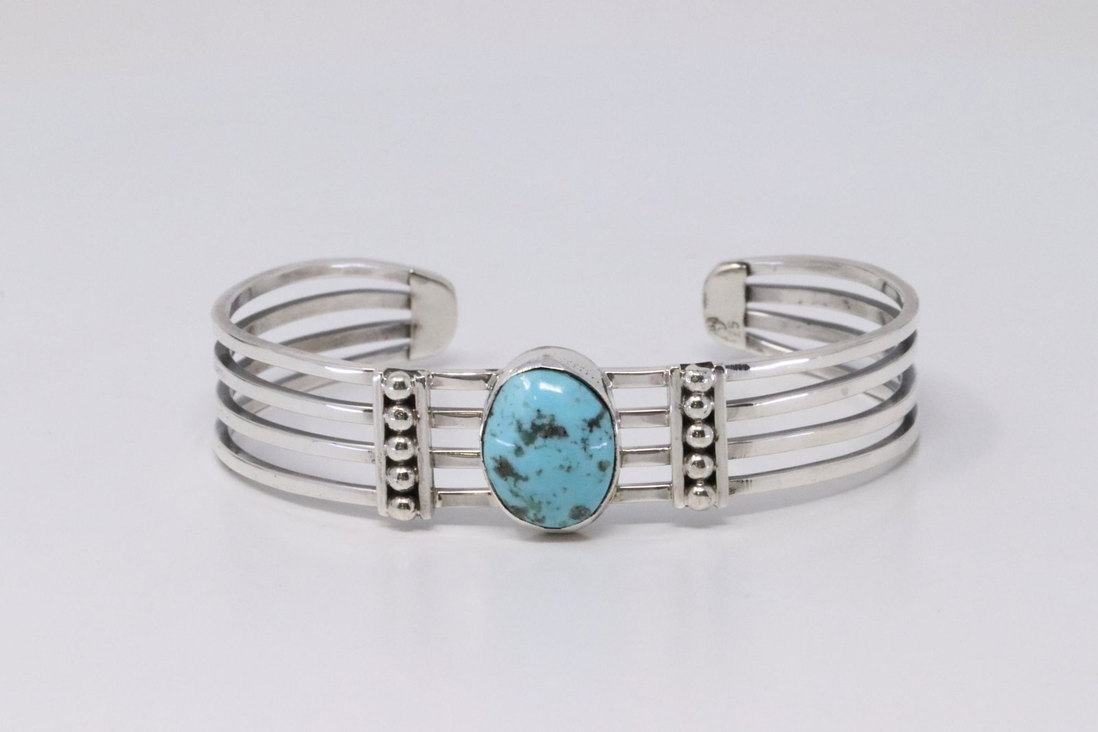 Native American Navajo Handmade Sterling Silver: This is a Native American Navajo Handmade Sterling Silver Turquoise Bracelet By Grace Kenneth.