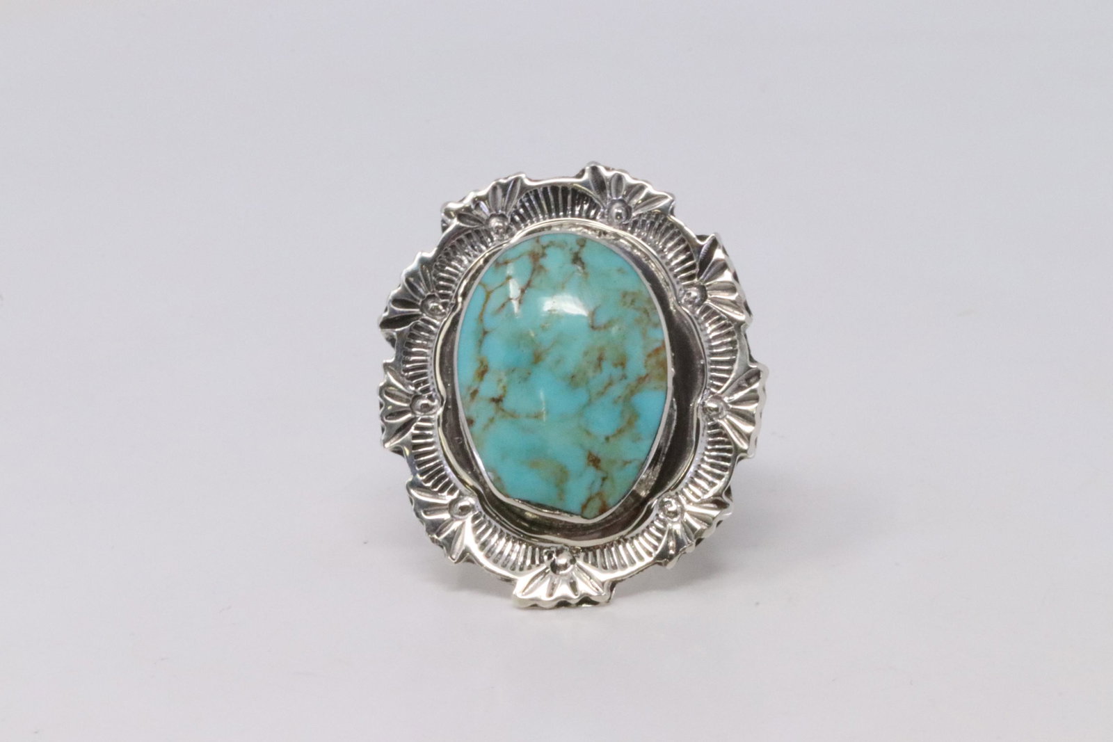 Native American Navajo Handmade Sterling Silver: This is a Native American Navajo Handmade Sterling Silver Turquoise Ring By Daniel Benally. Ring size: 6.50.