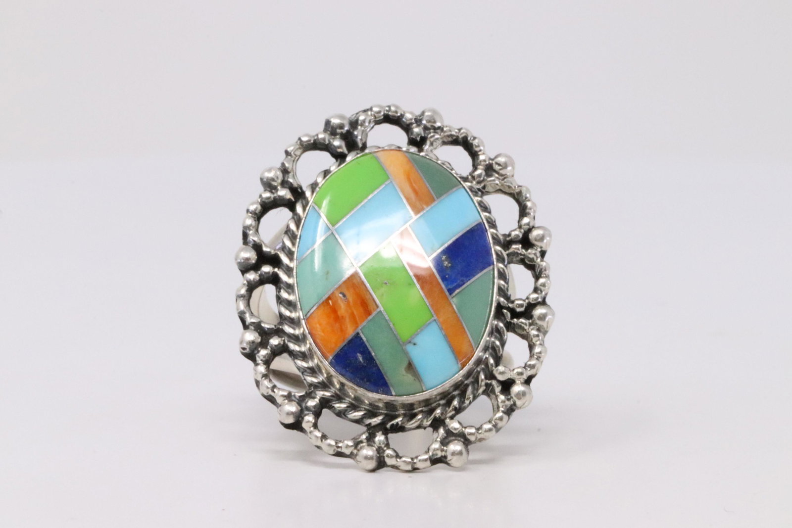 Native America Navajo Handmade Sterling Silver: This is a Native America Navajo Handmade Sterling Silver Multi-Color Inlay Ring By R.B. Ring size: 7.50.