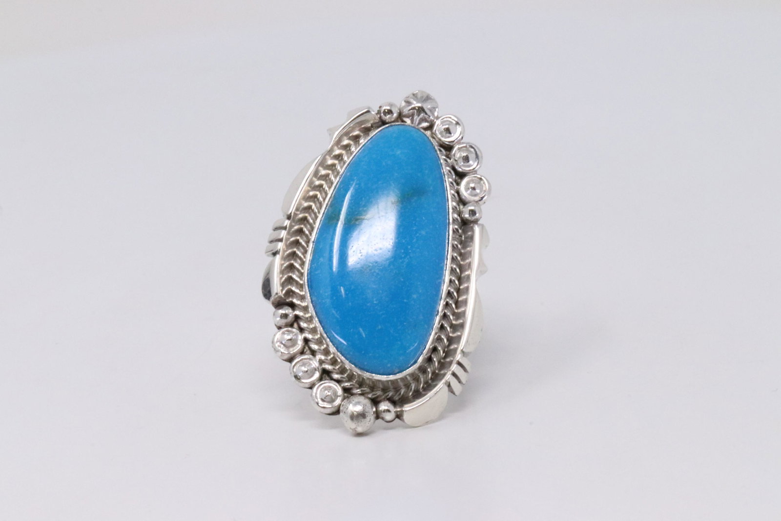 Native America Navajo Handmade Sterling Silver: This is a Native America Navajo Handmade Sterling Silver Turquoise Ring By Daniel Benally. Ring size: 7.00.