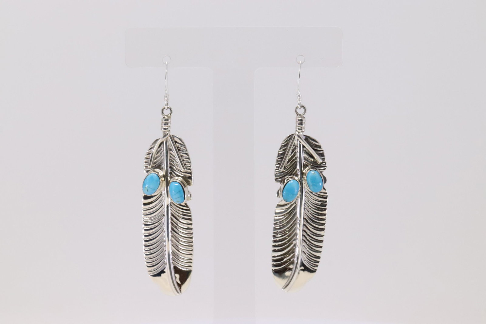 Native America Handmade Navajo Sterling Silver Feather: This is a Native America Handmade Navajo Sterling Silver Feather Turquoise Dangling Earring's By Greg Yazzie.