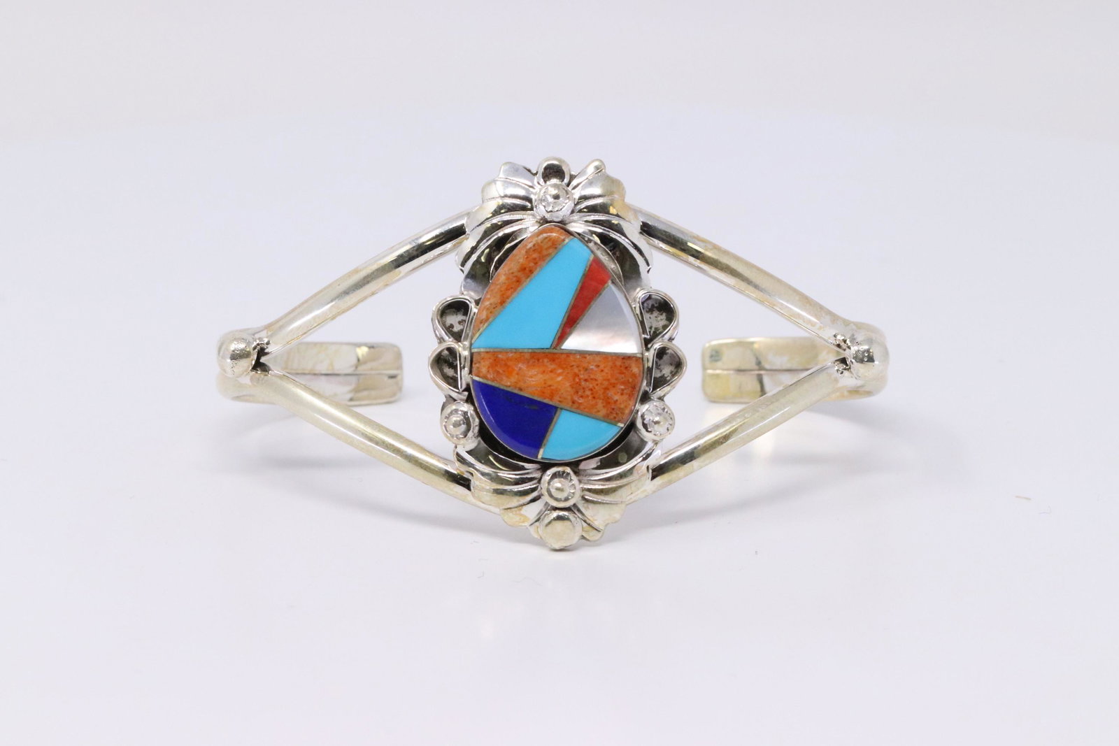 Native American Navajo Handmade Sterling Silver: This is a Native American Navajo Handmade Sterling Silver Multi-Color Bracelet by Jerome Yazzie.Bracelet Measurement inside is 5.00in