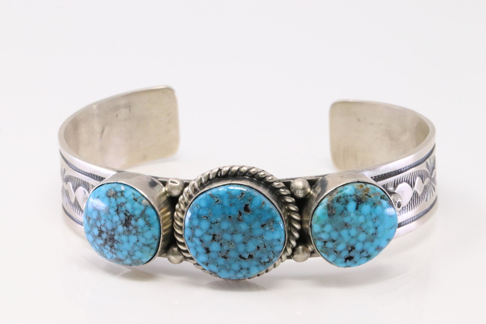 Native American Navajo Handmade Sterling Silver Kingma: This is a Native American Navajo Handmade Sterling Silver Kingma Web Turquoise Bracelet By Mary Ann Spencer.