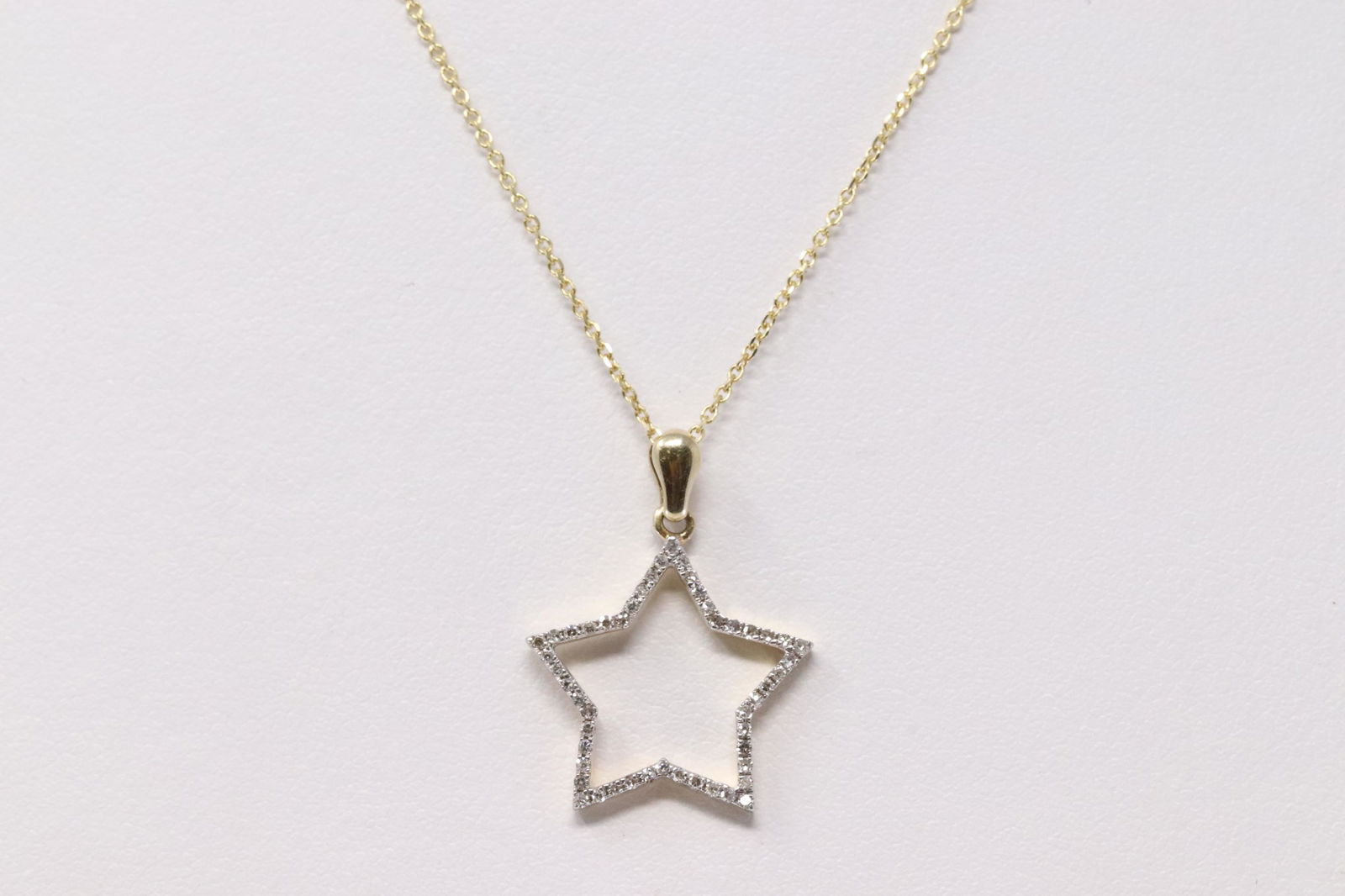 14Kt Yellow Gold Diamond Star Pendant. (1 of 4)
