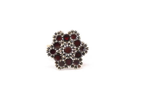 Ladies Vintage Garnet 14k Gold Ring: This is a vintage 14k yellow gold ladies ring, total of 12 garnets in the center also garnet accents around the larger stones. The design appears as wire on the band part. Ring size 7.5. Total weight