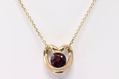 14Kt Yellow Gold Garnet Pendant.: Ladies 14Kt Yellow Gold Garnet Pendant. Pendant has One Garnet On the center & A 14K Necklace. Necklace length: 16.00" Total weight: 4.50 Grams. APO-38JD