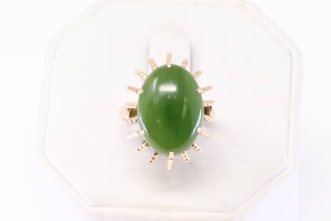 14kt Yellow Gold Jade Ring: A 14kt Yellow Gold Jade Ring. The ring size is 7.00. Total ring weight 5.10g.