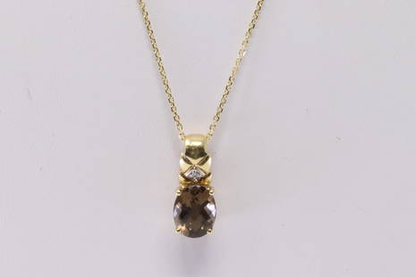 14kt Yellow Gold Smoky Topaz / Diamond Pendant.: Ladies 14kt Yellow Gold Smoky Topaz / Diamond Pendant. Pendant has 1 Smoky Topaz on the center with 1 Diamond & a 14K Necklace. Diamond weight: 0.01ct. Necklace length: 18.00" Total weight: 3.07