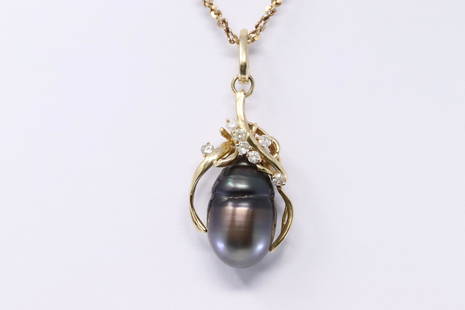 14K Gold Black Tahitian Pearl Diamond Ladies Pendant: 14K gold Pendant and Chain with Diamond, Appx 0.23 ctw of diamonds, Pearl Black Tahitian size (13.5 x20.0mm), Chain size 19". Total weight 16.5 grams.