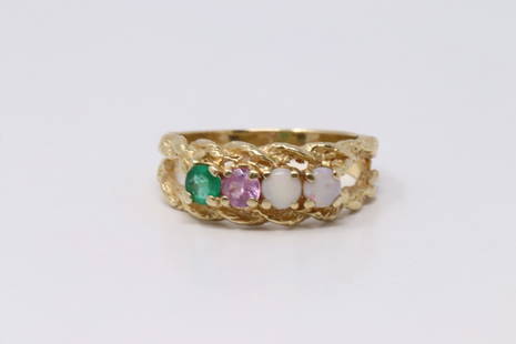14Kt Yellow Gold Multi-Color Ring.: 14Kt Ladies Yellow Gold Multi-Color Ring. Ring has 4 Stone of Colors In the center.Two Opal,Emerald,pink topaz. Ring size: 7.00. Total weight: 3.59 Grams. VN-8U1B