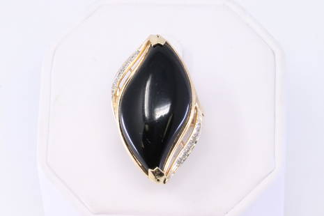 ONYX 14K Gold with Diamond Accent: This is a ladies 14k ring Onyx center stone measures Appx (1.5in L X 14.95mm W) total 7 diamond accent on the sides. Ring size 6. Total weight 8.1 grams