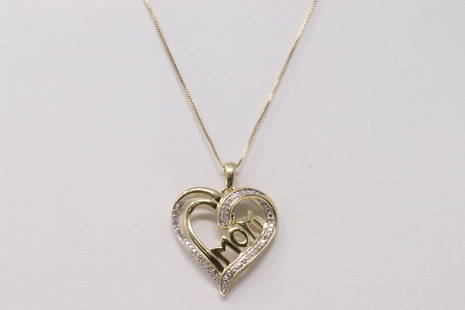 Yellow Gold Heart Diamond Pendant.: Ladies Yellow Gold Heart Diamond Pendant. Pendant has Round Diamonds & Written Mom on the center With A Necklace. Diamonds weight: 0.12ctw. Necklace length: 18.00" Total weight: 2.78 Grams.