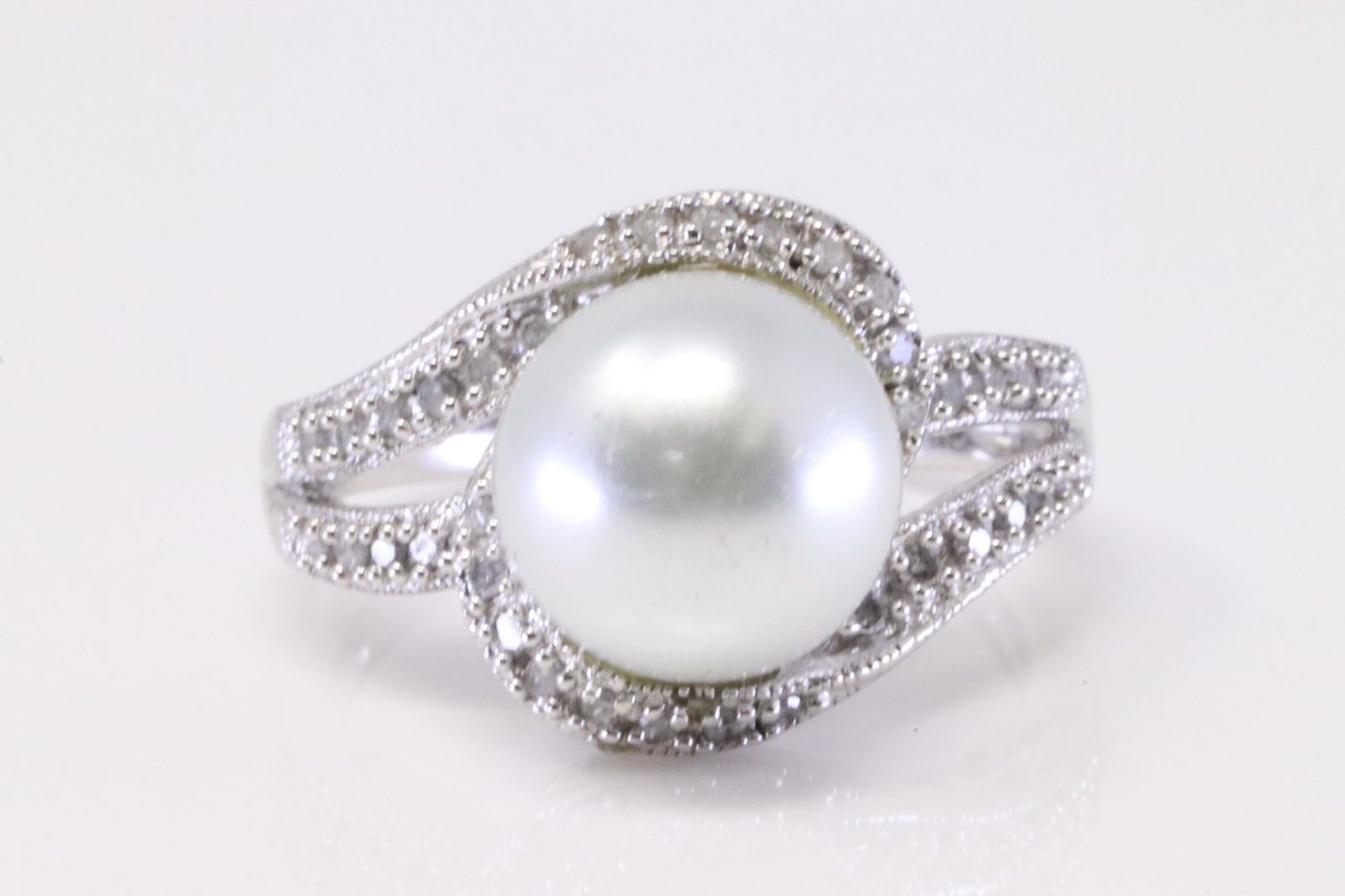 10Kt White Gold Pearl / Diamond Bypass Ring. (1 of 4)