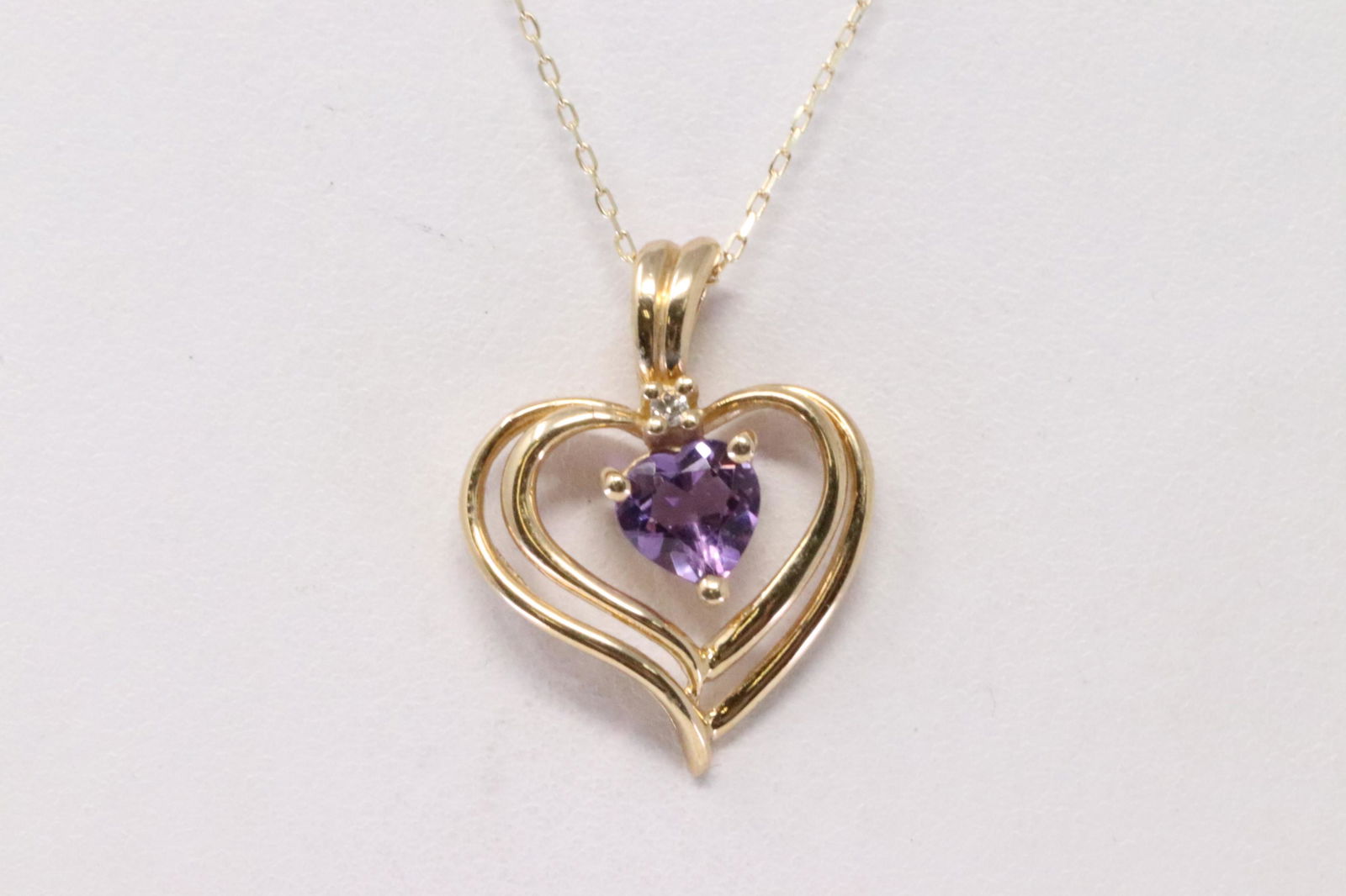 14Kt Yellow Gold Amethyst / Diamond Heart Pendant. (1 of 4)
