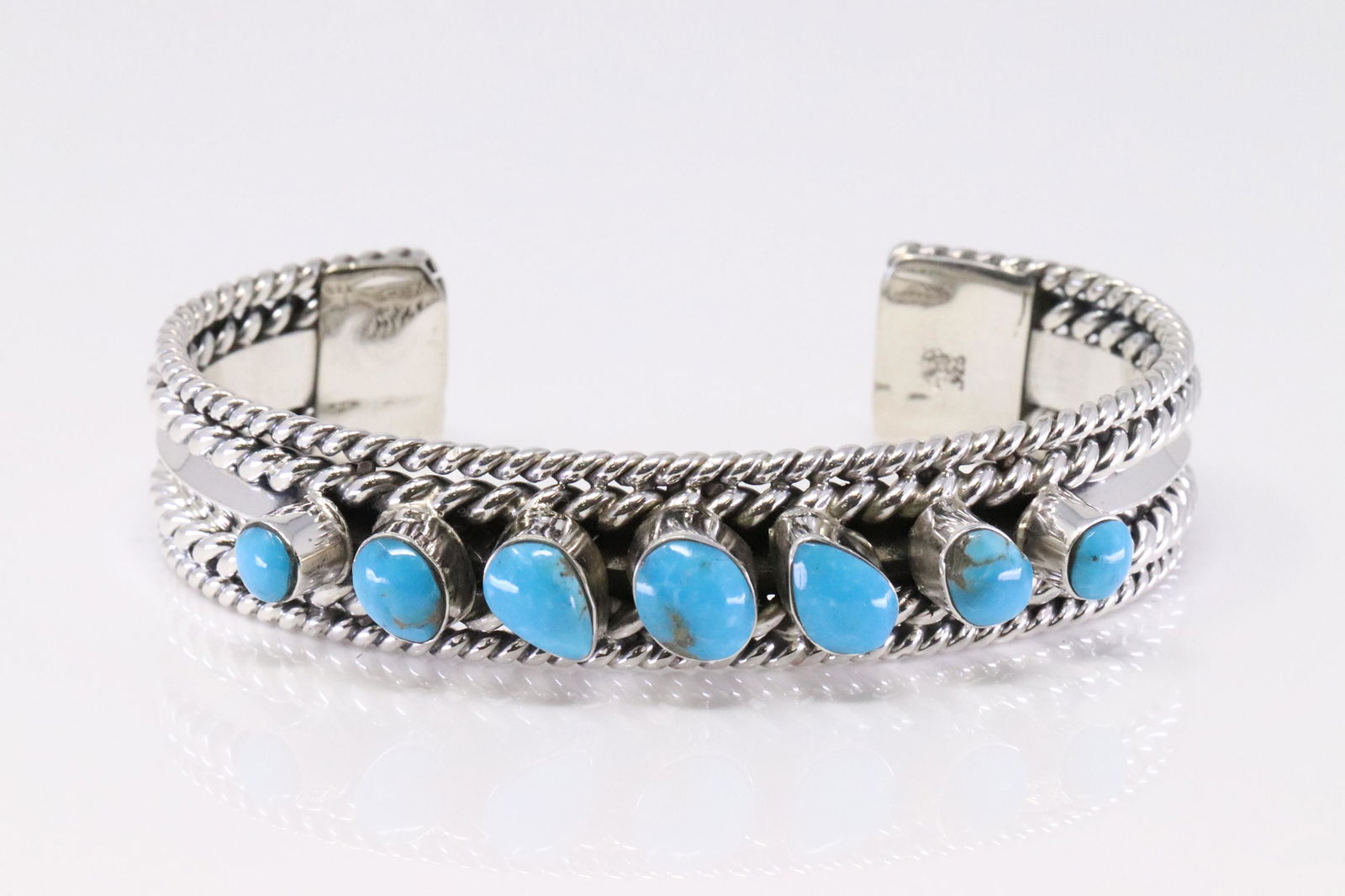 Native American Navajo Handmade Sterling Silver Turquoise Bracelet By Mike Smith.: This is a Native American Navajo Handmade Sterling Silver Turquoise Bracelet By Mike Smith.