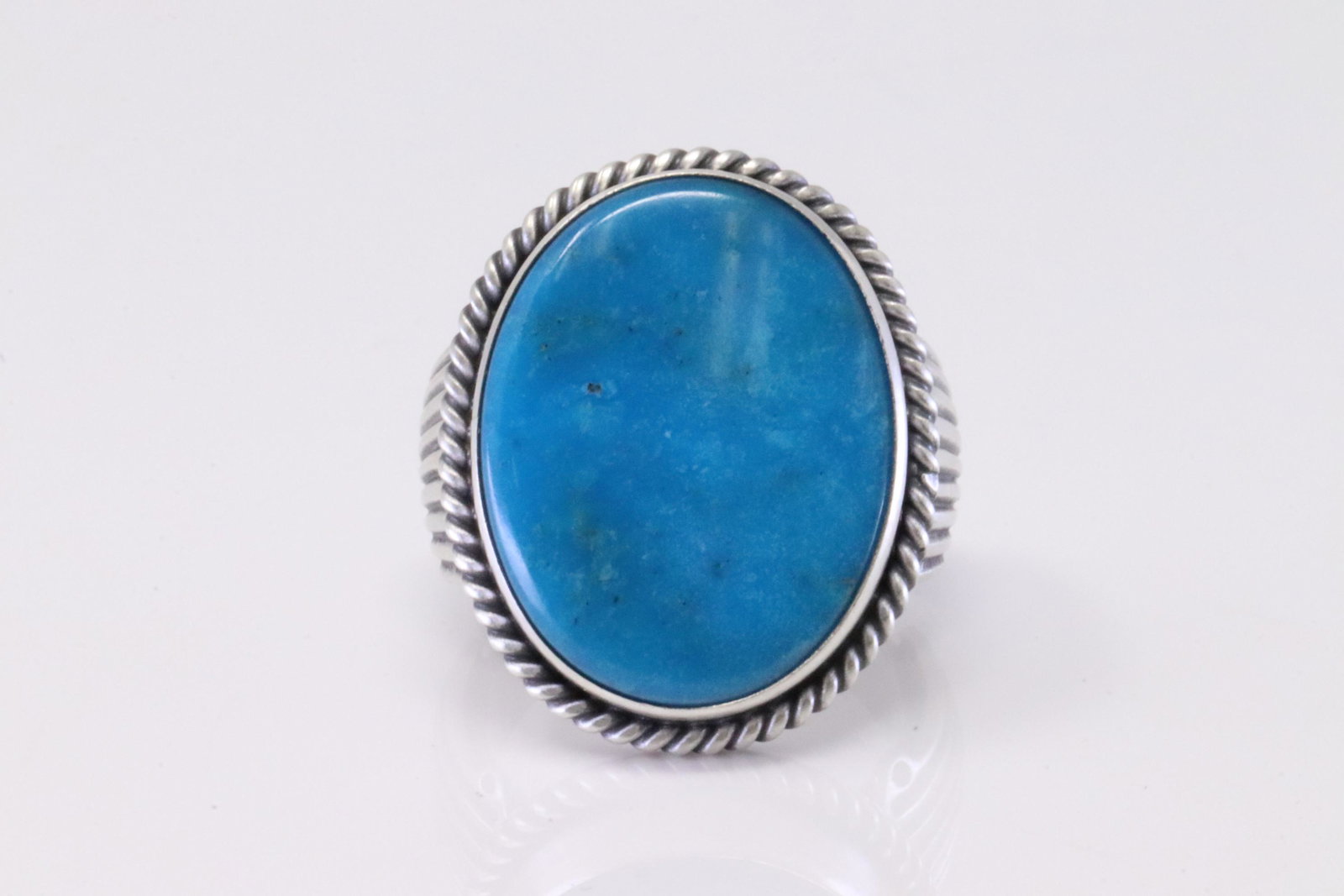 Native America Navajo Handmade Sterling Silver Turquoise Ring By Samuel Yellowhair.: This is a Native America Navajo Handmade Sterling Silver Turquoise Ring By Samuel Yellowhair. Ring size: 8.25.