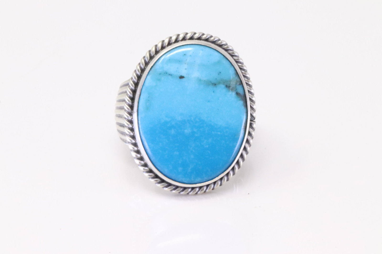 Native America Navajo Handmade Sterling Silver Turquoise Ring By Samuel Yellowhair.: This is a Native America Navajo Handmade Sterling Silver Turquoise Ring By Samuel Yellowhair. Ring size: 7.25.
