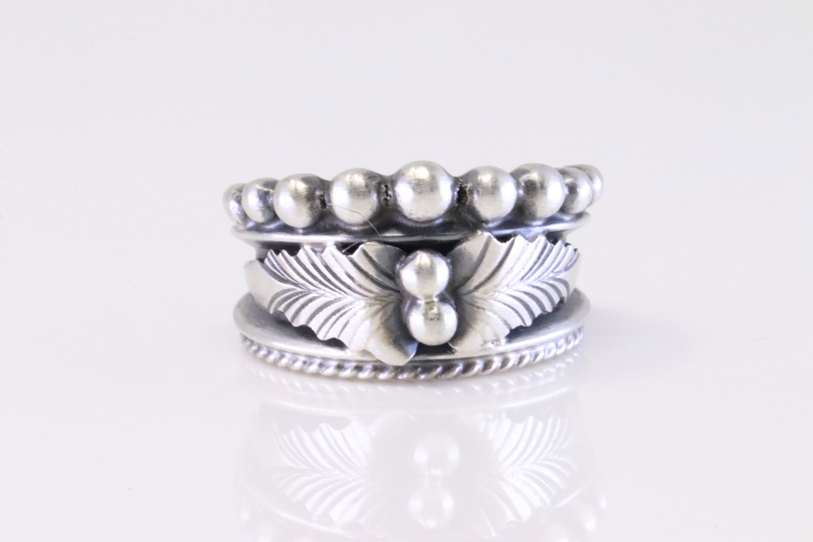 Native American Navajo Sterling Silver Ring By Tom Lewis.: This is a Native American Navajo Sterling Silver Ring By Tom Lewis. Ring size: 7.50.