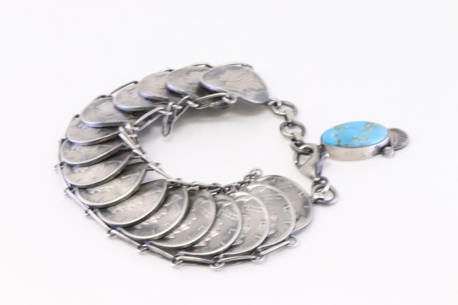 Native America Navajo Handmade Sterling Silver Turquopise Liberty Dime Bracelet Link By James: This is a Native America Navajo Handmade Sterling Silver Turquopise Liberty Dime Bracelet Link By James McCabe. Bracelet length: 7.00" Adjustable.