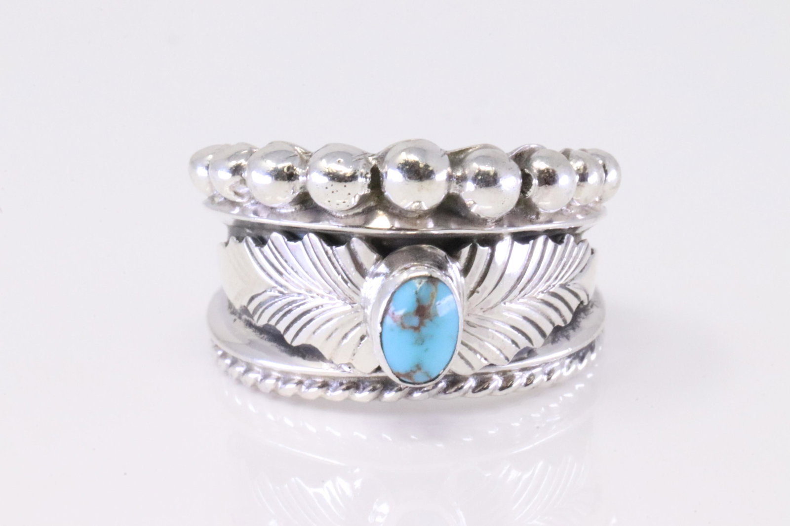 Native America Navajo Sterling Silver Turquoise Ring By Tom Lewis.: This is a Native America Navajo Sterling Silver Turquoise Ring By Tom Lewis. Ring size: 7.25.