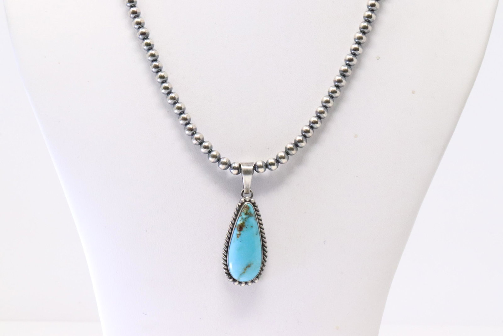 Native America Navajo Sterling Silver Turquoise Pendant By Scott Skeets. With Pearl Beaded Sterling: This is a Native America Navajo Sterling Silver Turquoise Pendant By Scott Skeets. With Pearl Beaded Sterling Silver Machine Made Necklace. Necklace length: 22.00"