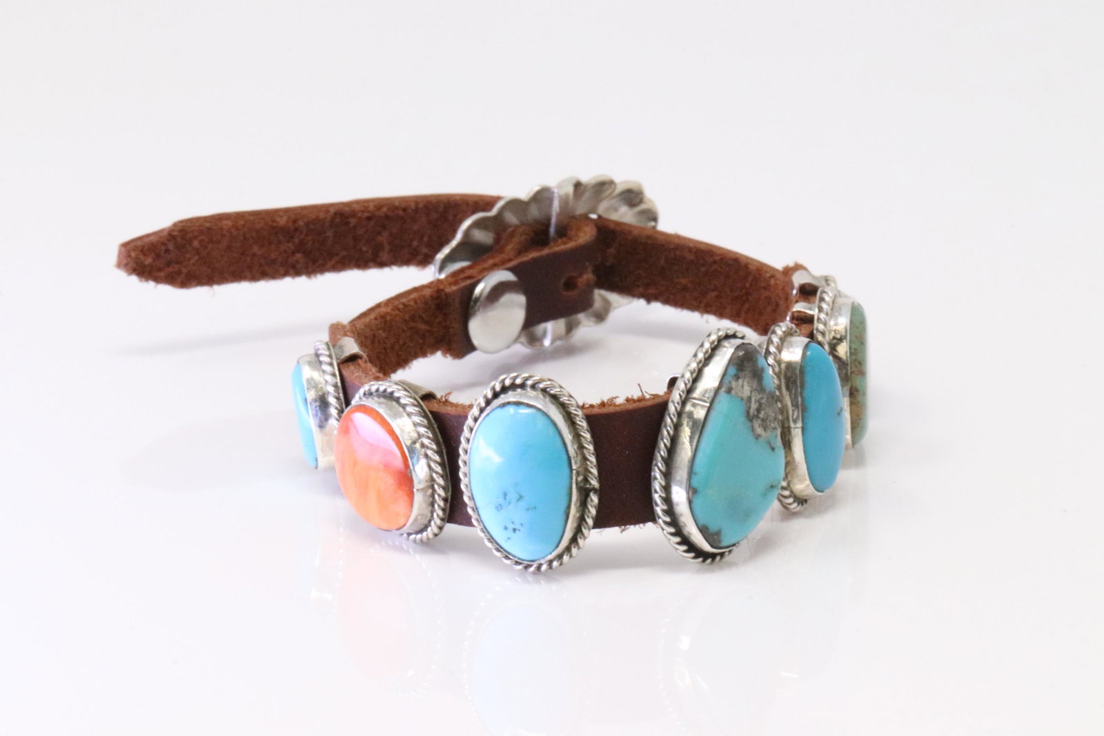 Native America Navajo Sterling Silver Spiny & Turquoise Leather Bracelet By B.C / M.: This is a Native America Navajo Sterling Silver Spiny & Turquoise Leather Bracelet By B.C / M. Bracelet length: 9.00" Adjustable.