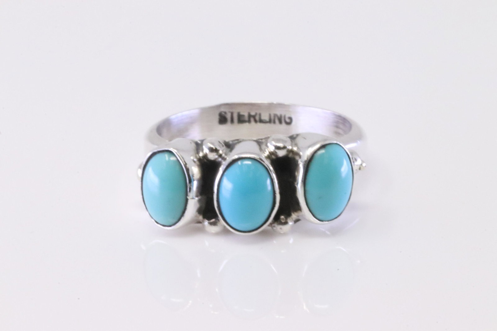 Native America Navajo Sterling Silver Turquoise Ring By Harris Largo.: This is a Native America Navajo Sterling Silver Turquoise Ring By Harris Largo. Ring size: 6.25.