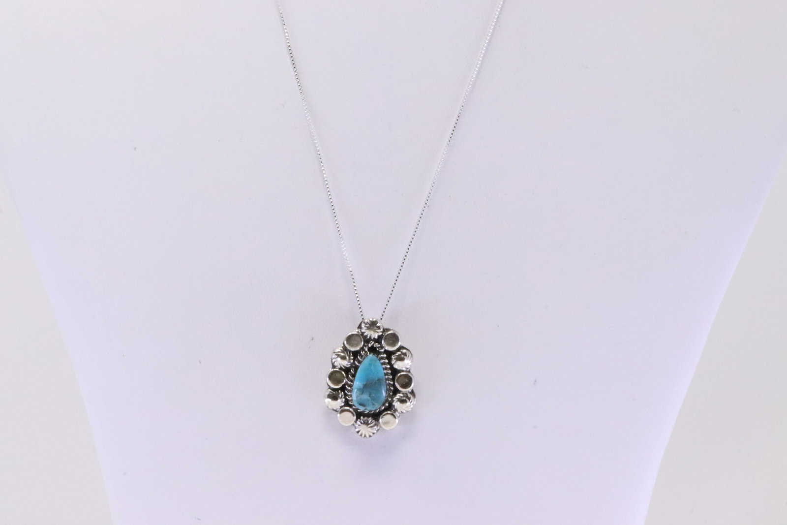 Native America Navajo Sterling Silver Turquoise Pendant By Sadie Jim. With A 925 Necklace.: This is a Native America Navajo Sterling Silver Turquoise Pendant By Sadie Jim. With A 925 Necklace. Necklace length: 18.00"