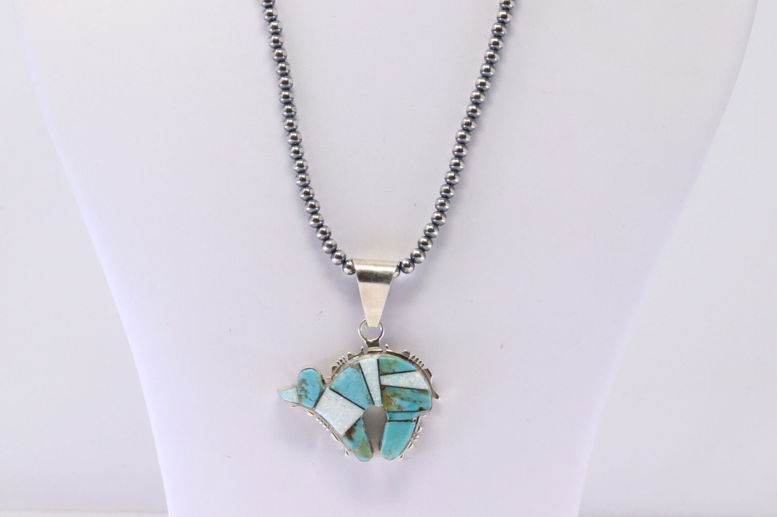 Native America Navajo Sterling Silver Bear Turquoise Pendant By Steve Francisco. With Pearl Beaded: This is a Native America Navajo Sterling Silver Bear Turquoise Pendant By Steve Francisco. With Pearl Beaded Sterling Silver Machine Made Necklace. Necklace length: 16.00"