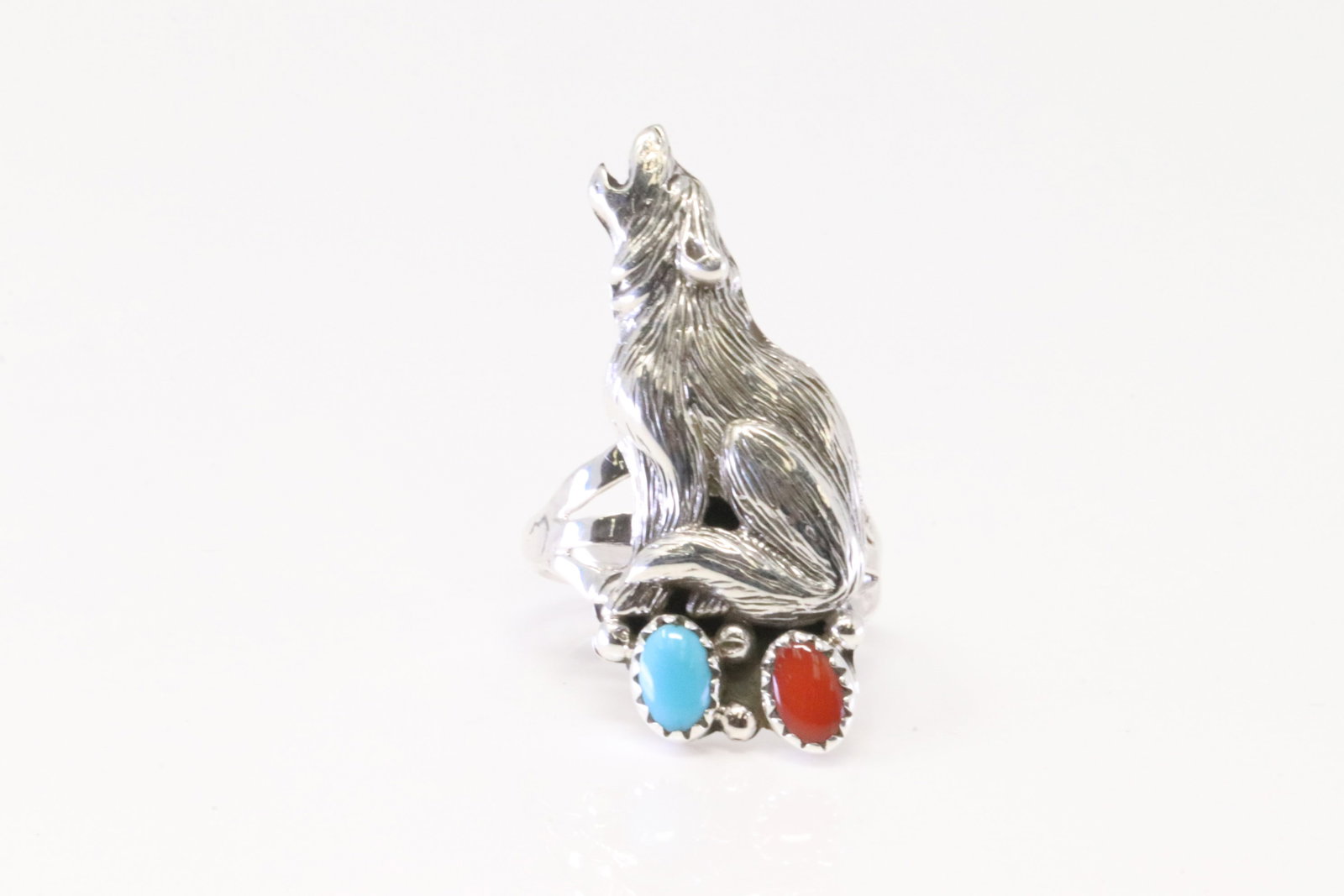 Native America Navajo Sterling Silver Coral & Turquoise Wolf Ring By Jerryson Henio.: This is a tive America Navajo Sterling Silver Coral & Turquoise Wolf Ring By Jerryson Henio. Ring size: 7.75.