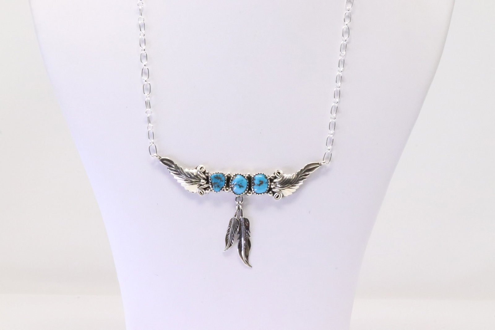 Native America Navajo Sterling Silver Turquoise Necklace Feather By Sadie Jim.: This is a Native America Navajo Sterling Silver Turquoise Necklace Feather By Sadie Jim. Necklace length: 16.00"