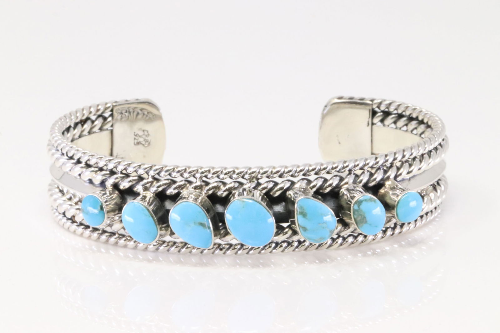 Native America Navajo Sterling Silver Turquoise Bracelet By Mike Smith.: This is a Native America Navajo Sterling Silver Turquoise Bracelet By Mike Smith.