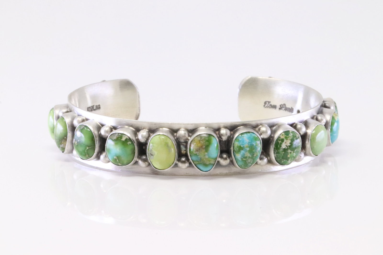 Native America Navajo Sterling Silver Sonora Gold Turquoise Barcelet By Tom Lewis.: This is a Native America Navajo Sterling Silver Sonora Gold Turquoise Barcelet By Tom Lewis.