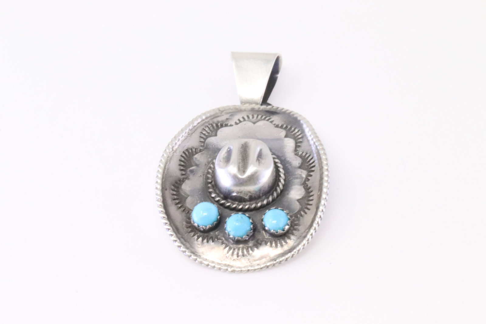 Native America Navajo Sterling Silver Turquoise Cowboy Hat Pendant By Bobby Platero.: This is a Native America Navajo Sterling Silver Turquoise Cowboy Hat Pendant By Bobby Platero.