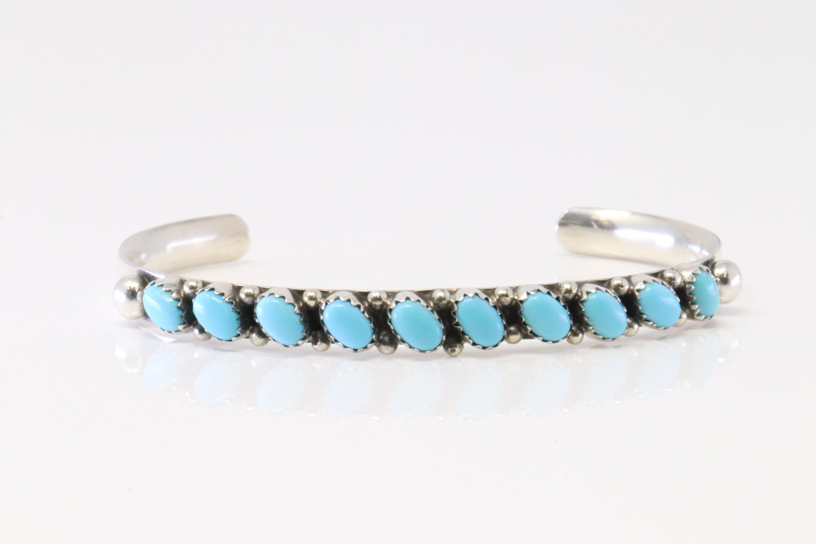 Native American Navajo Sterling Silver Kingman Turquoise Bracelet By Calvin James.: This is a Native American Navajo Sterling Silver Kingman Turquoise Bracelet By Calvin James.