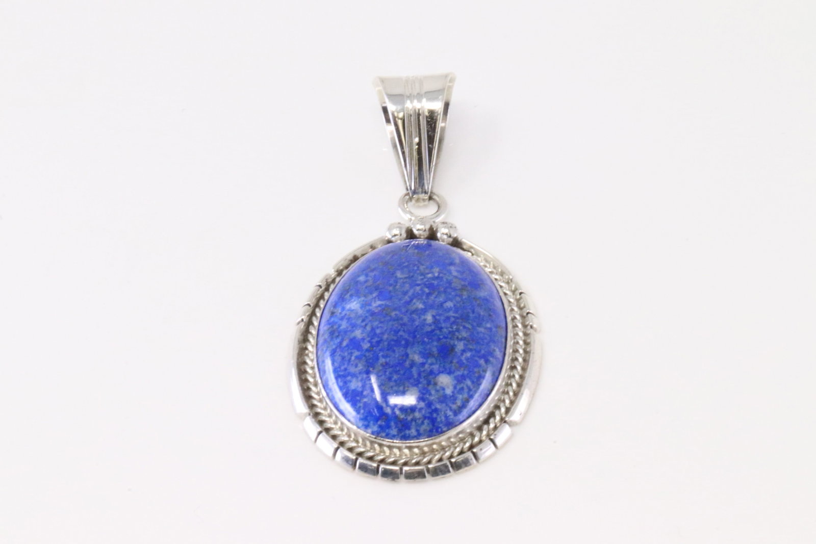 Native America Navajo Sterling Silver Lapis Pendant By Samuel Yellowhair.: This is a Native America Navajo Sterling Silver Lapis Pendant By Samuel Yellowhair.